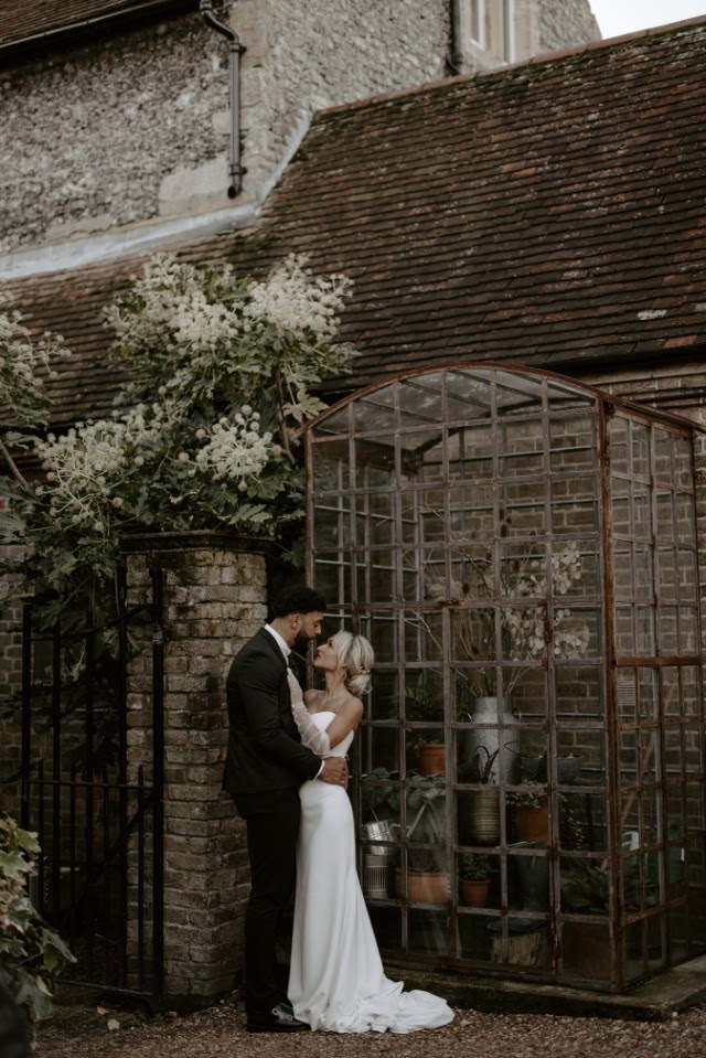 Kissing couple outside at Chapel House Estate in Kent