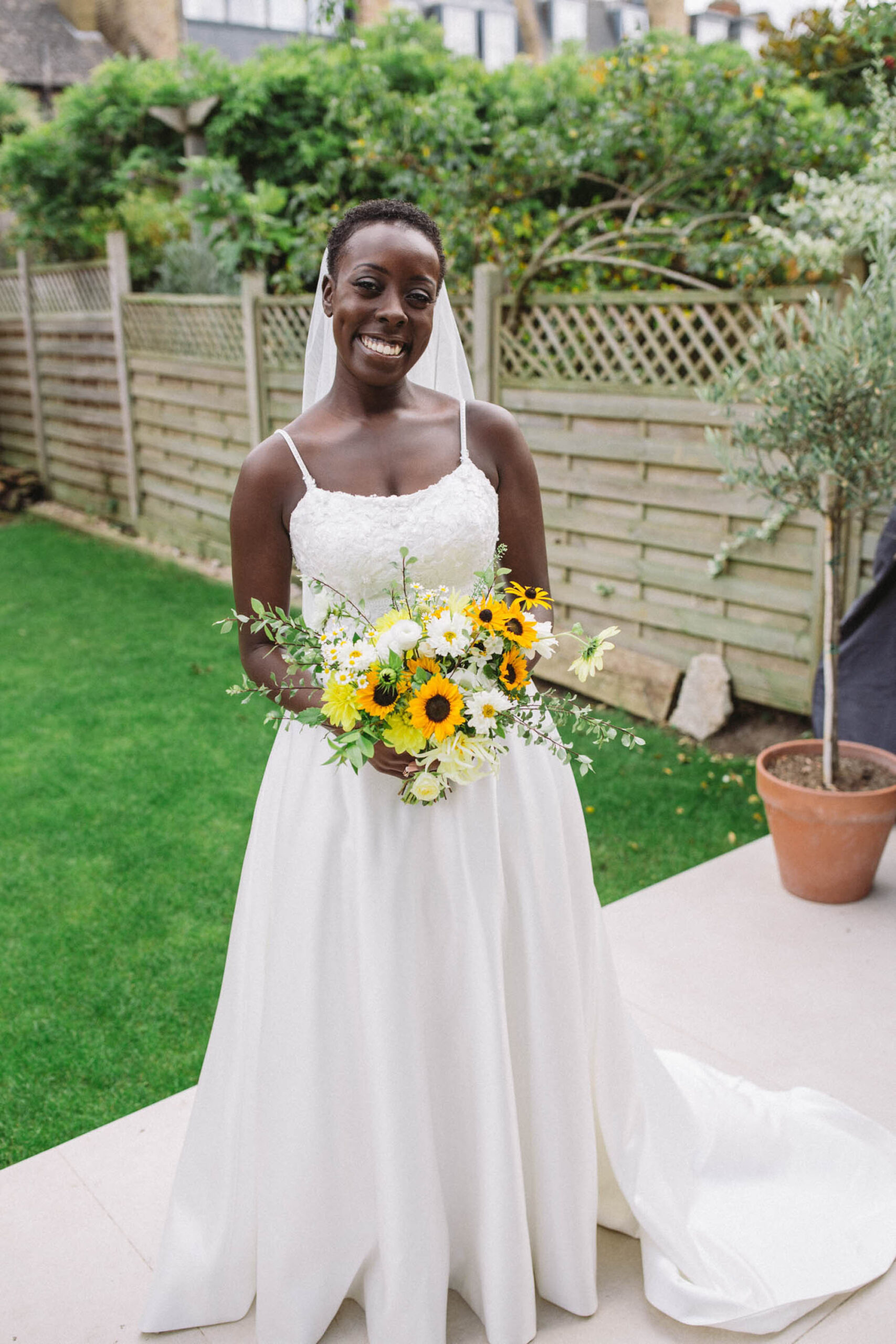 sunflower filled church wedding for Erina and Dave, with Hannah Christine Photography