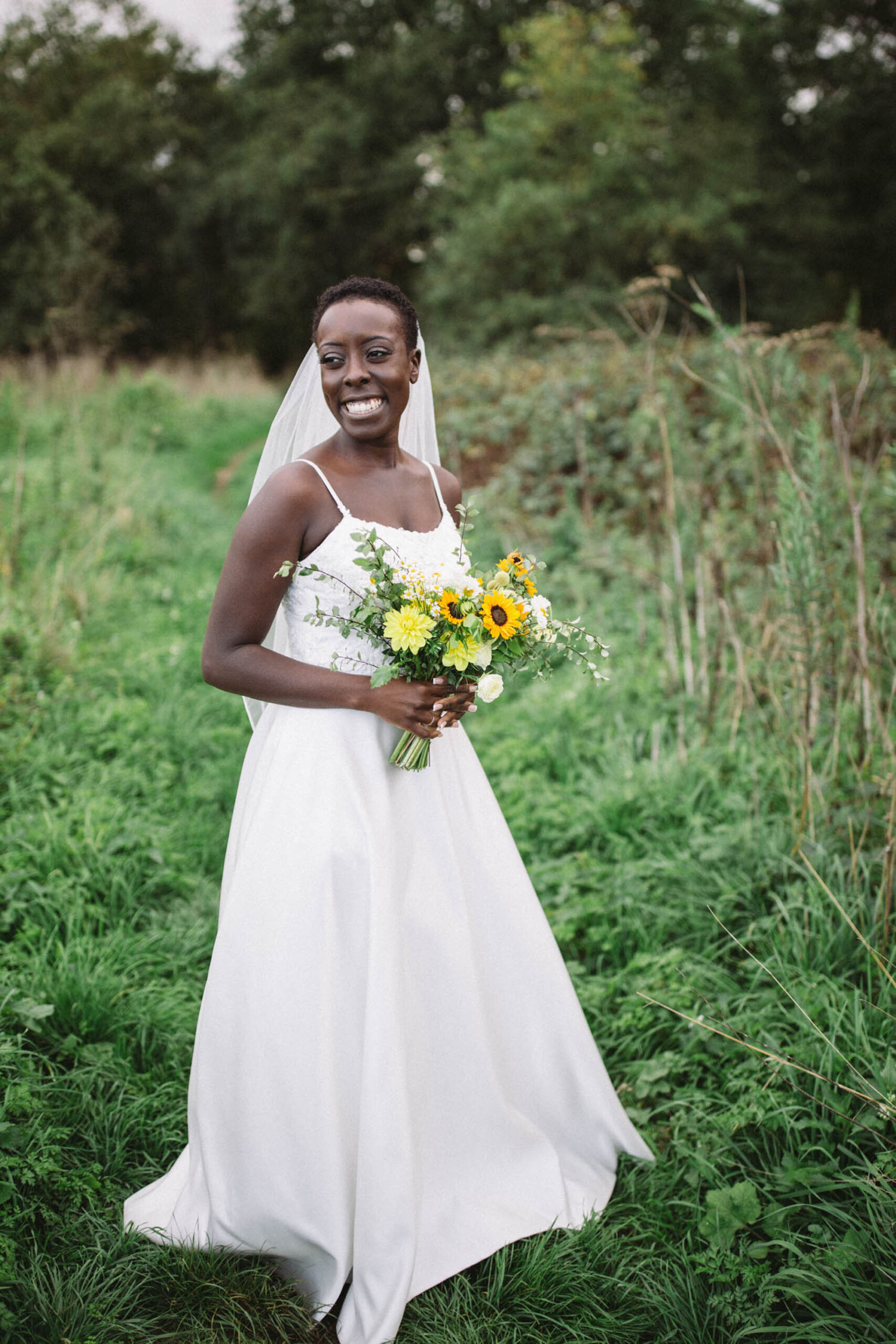 sunflower filled church wedding for Erina and Dave, with Hannah Christine Photography