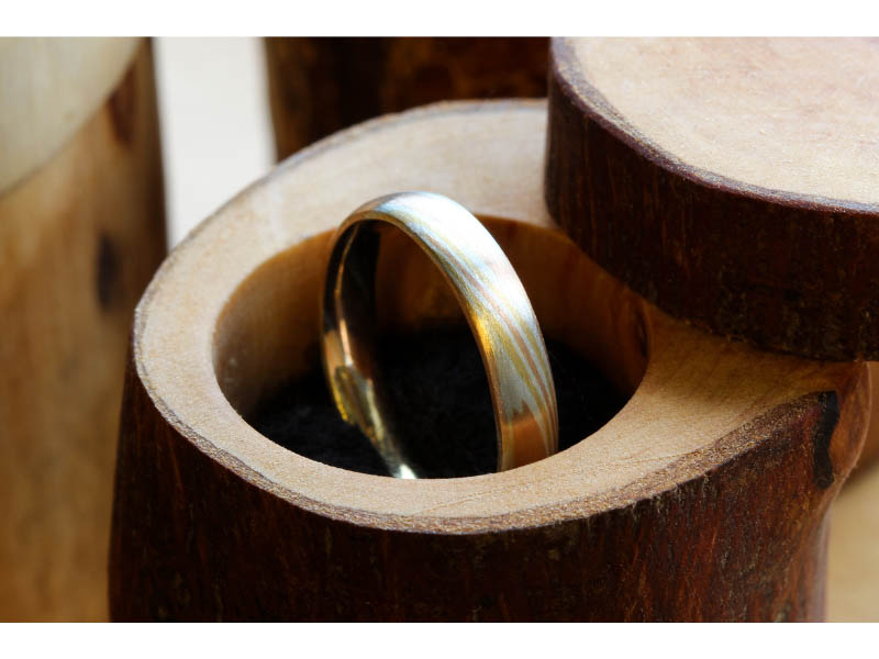 Wedding ring in a handmade wooden box by Jacqueline and Edward