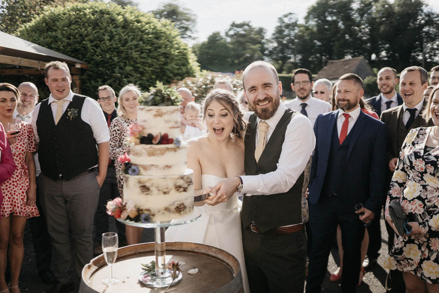 Cake cutting outside at The Manor Estate - Will Stedman Photography