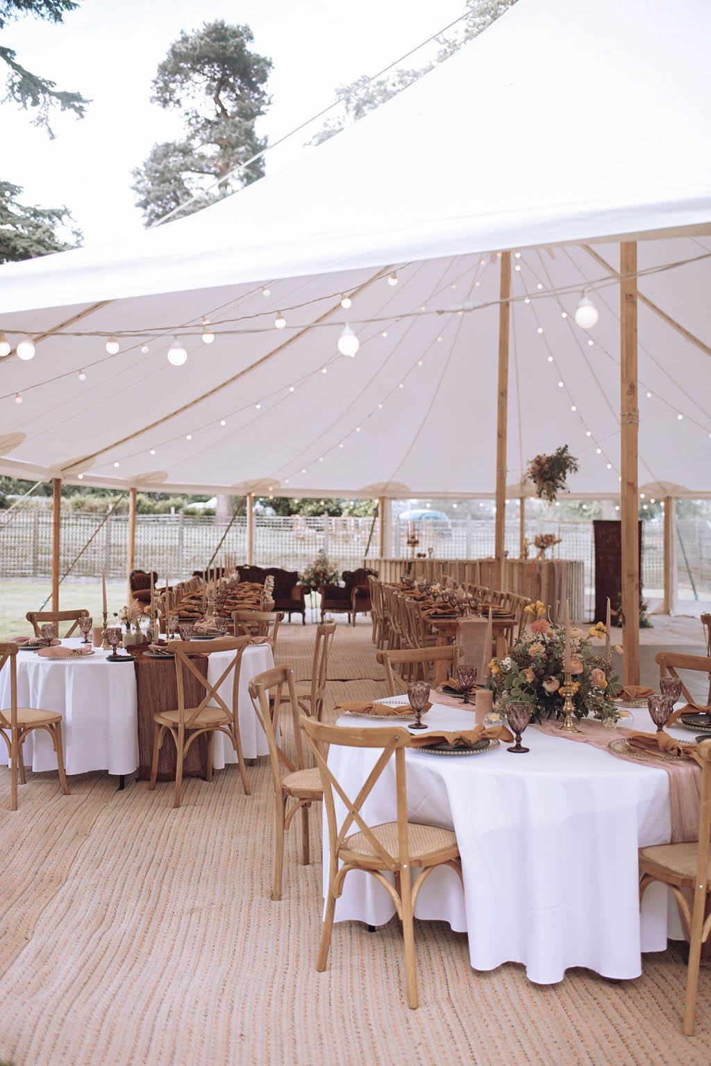 Marquee setup inside with festoon lights by Kelly Hiscox Photography