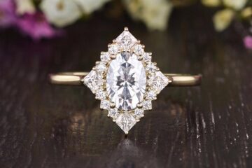 Vintage style, oval cut moissanite engagement ring, with halo