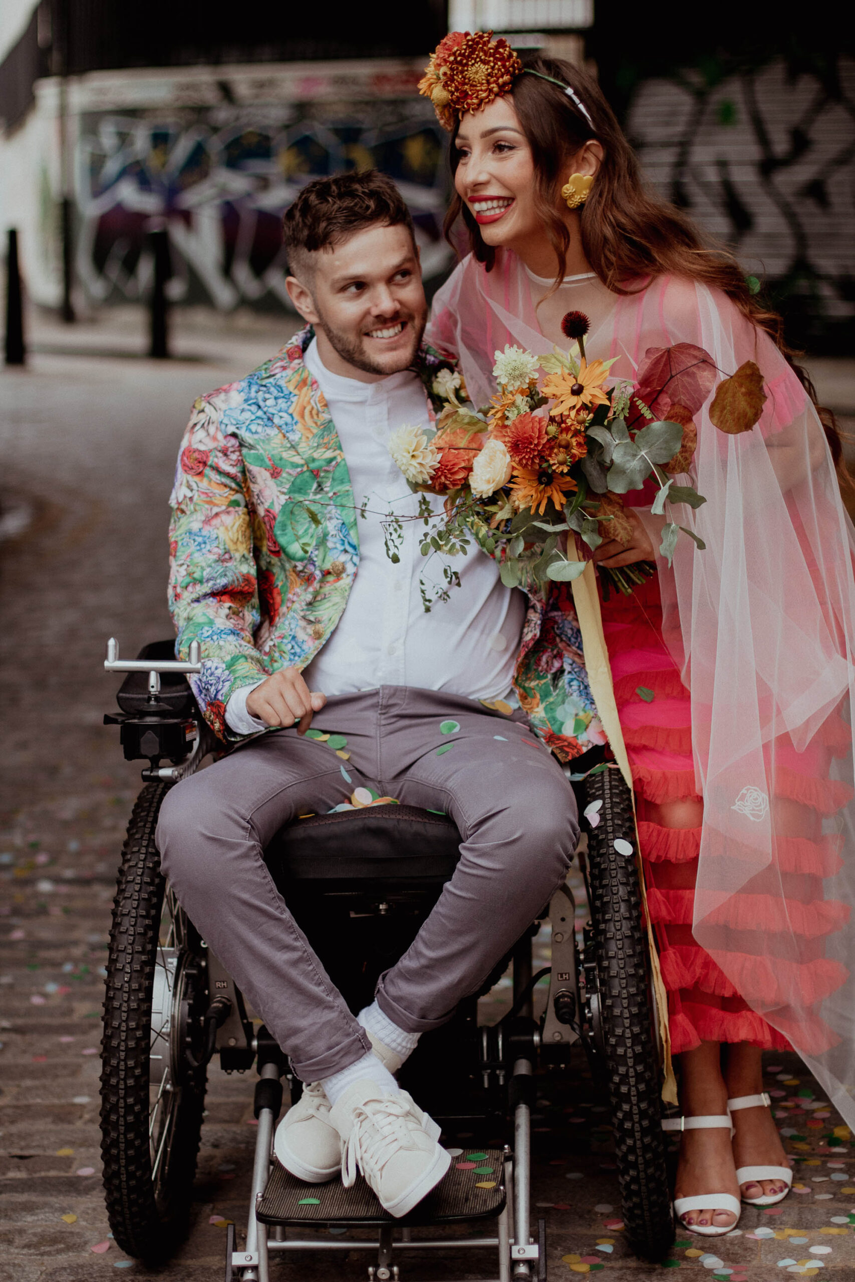 Groom and bride at a colourful vibrant wedding