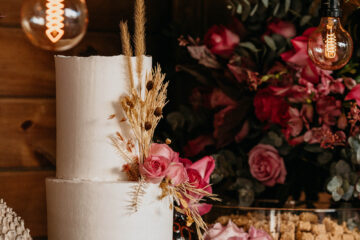 stock image of a wedding cake with festoon lights
