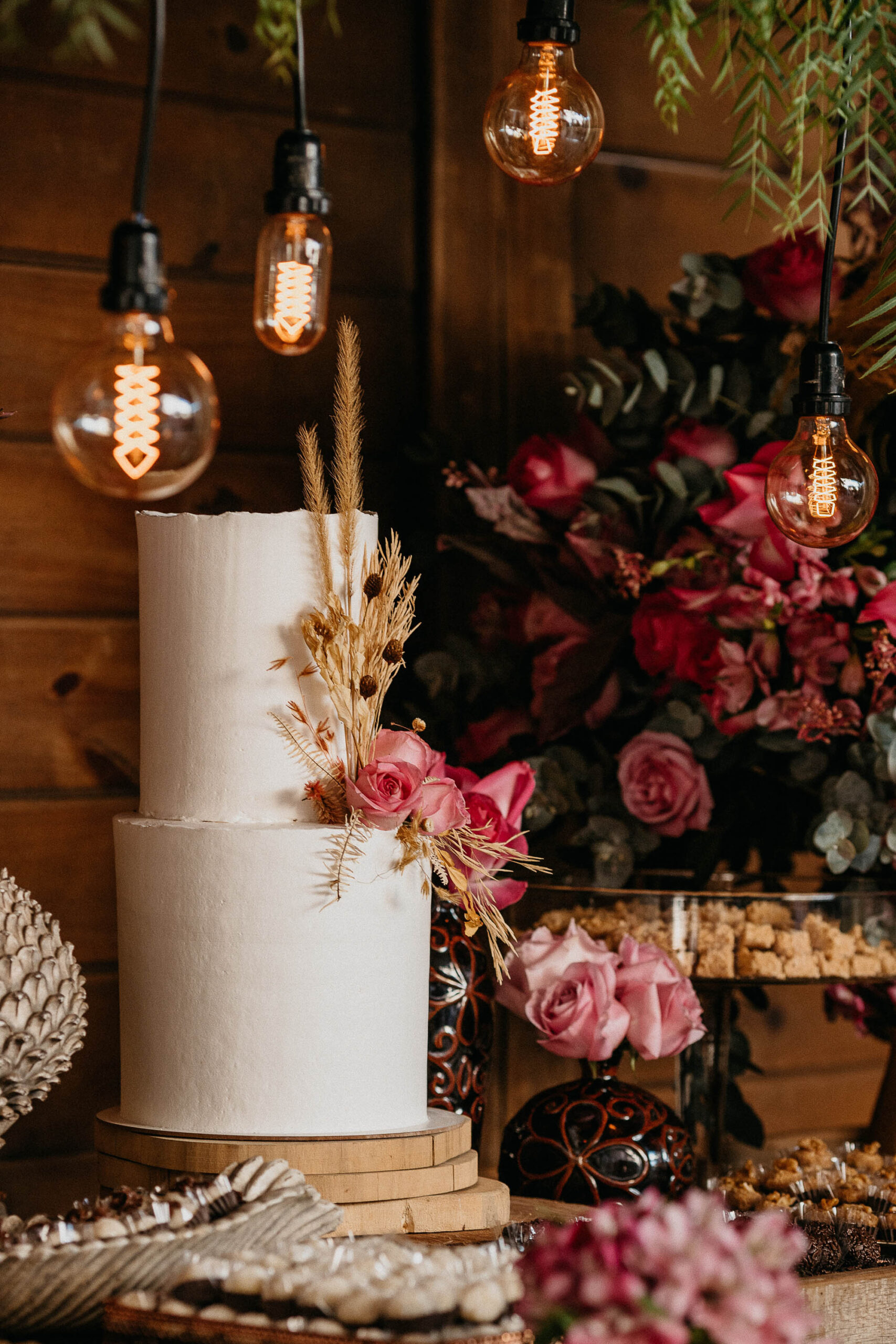 stock image of a wedding cake with festoon lights