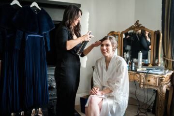 Phoebe & Rob's gorgeous black tie wedding at Woodhall Manor, with Lisa