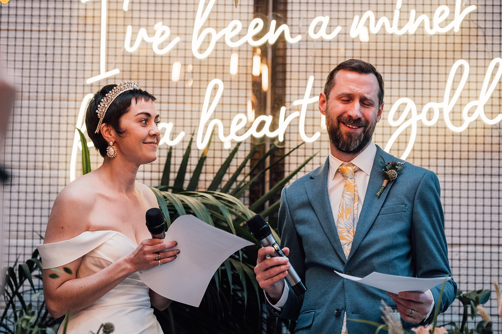 Newlyweds giving a speech at their wedding - image by Emis Weddings