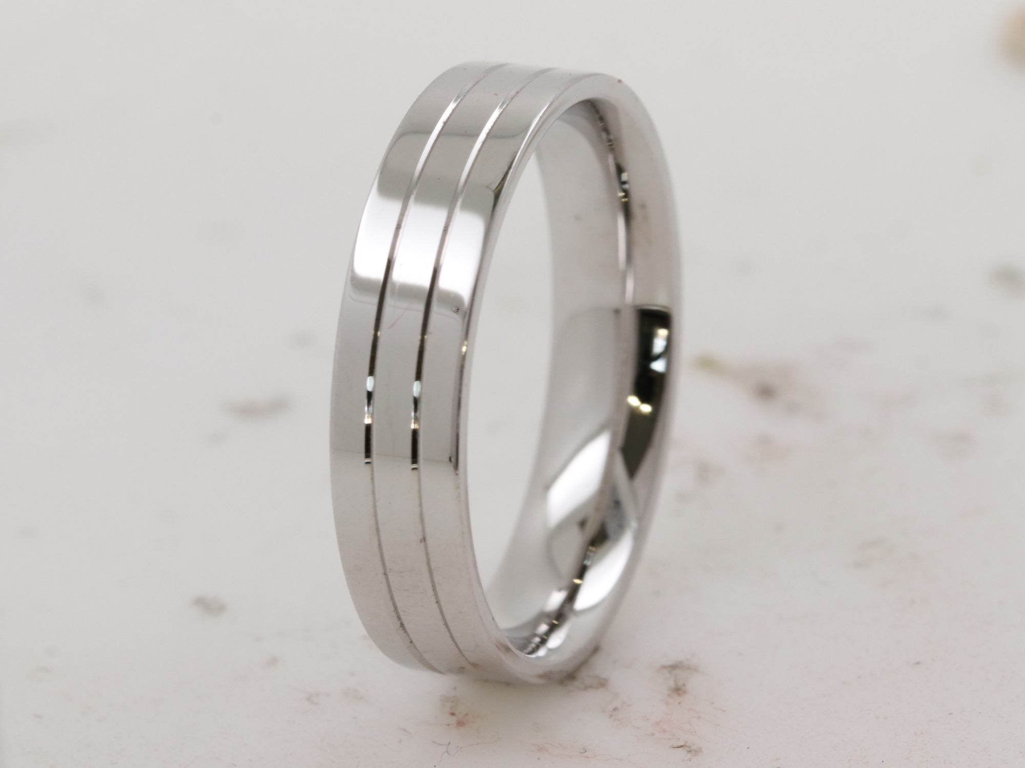 Gents wedding ring in polished platinum made in Ireland