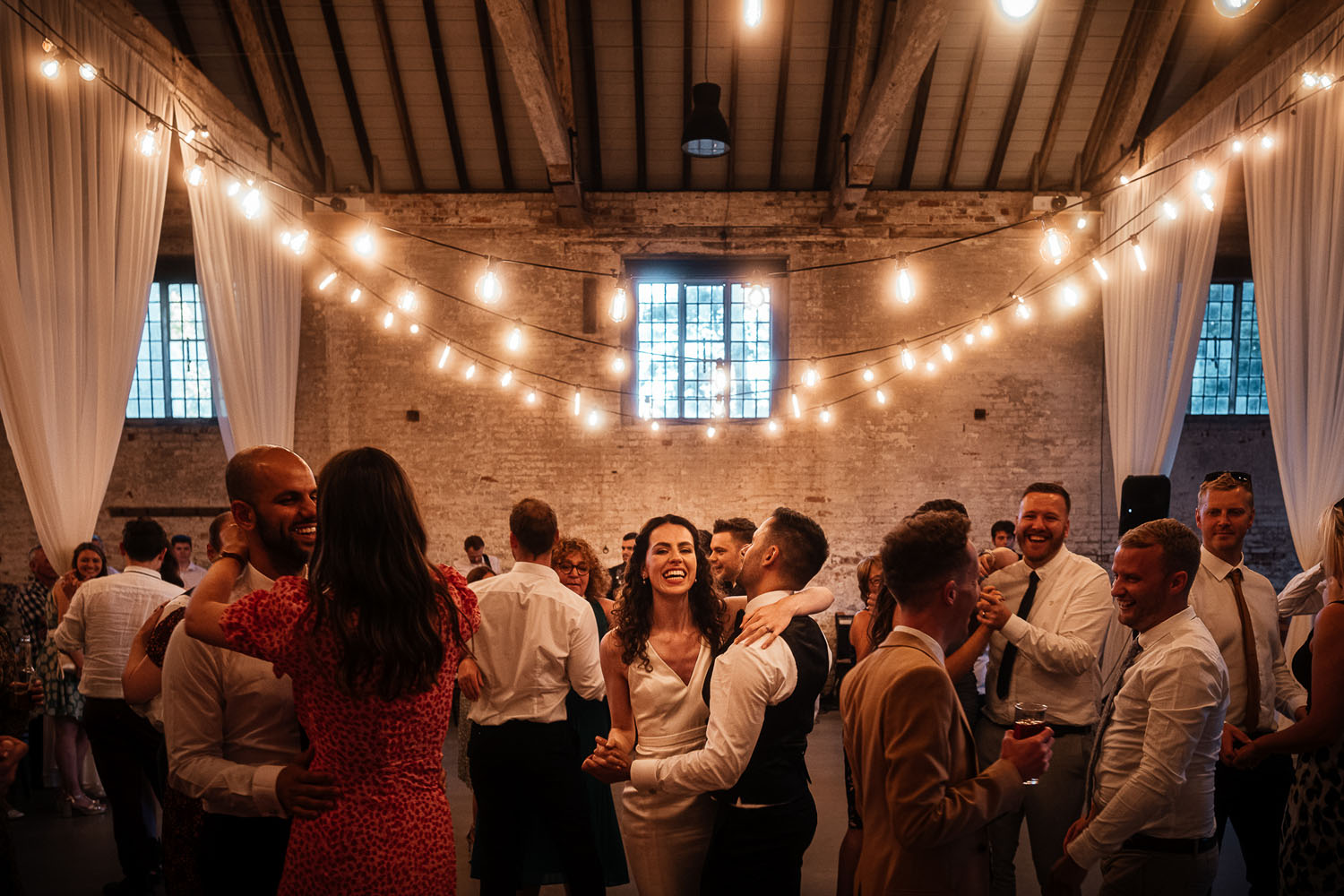 Festoon lights and a packed dance floor for a Derby wedding with Simon Dewey Photography