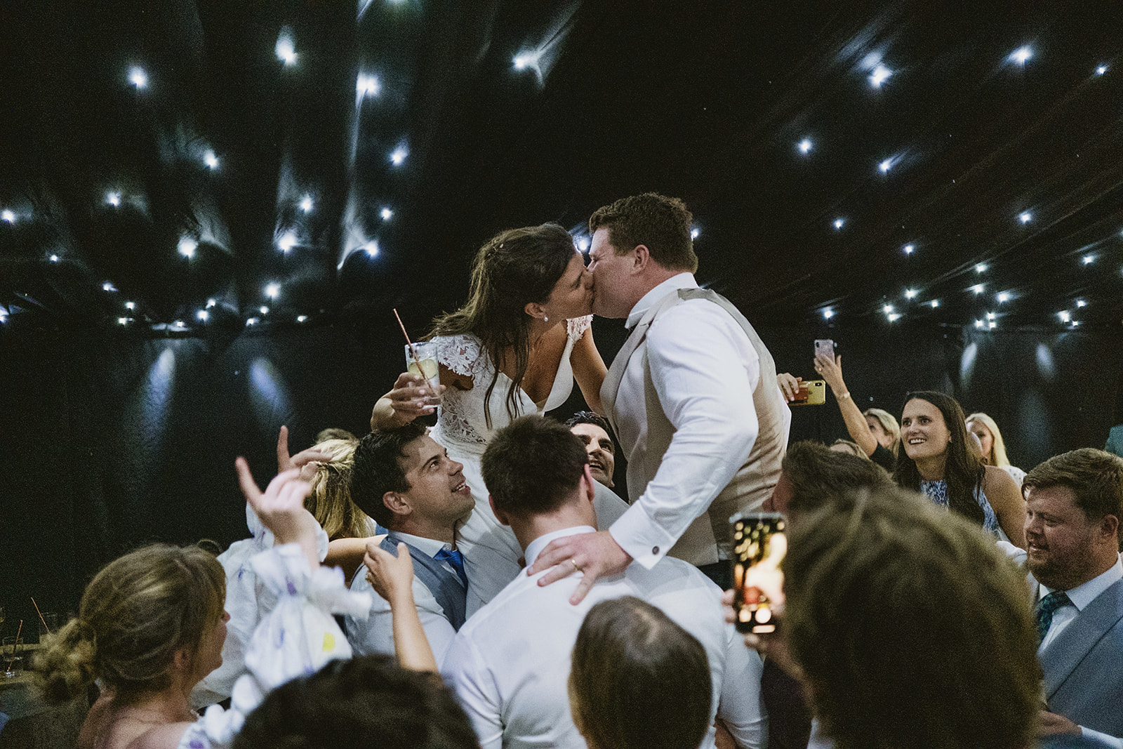 guests enjoying Georgina and Kyle's Buckinghamshire wedding by York Place Studios
