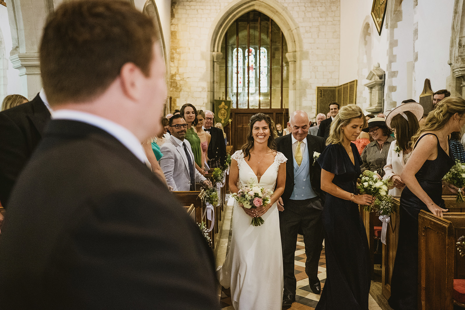 groom and bride celebrating with guests by award winning London documentary wedding photographers York Place Studios