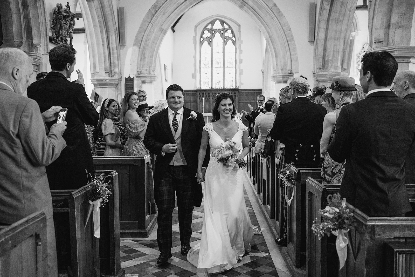 guests enjoying Georgina and Kyle's Buckinghamshire wedding by York Place Studios