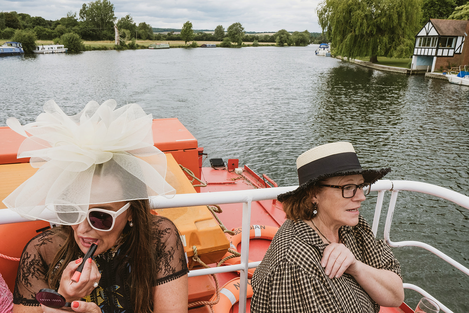 candid natural photography at a riverside marquee wedding in Buckinghamshire by York Place Studios