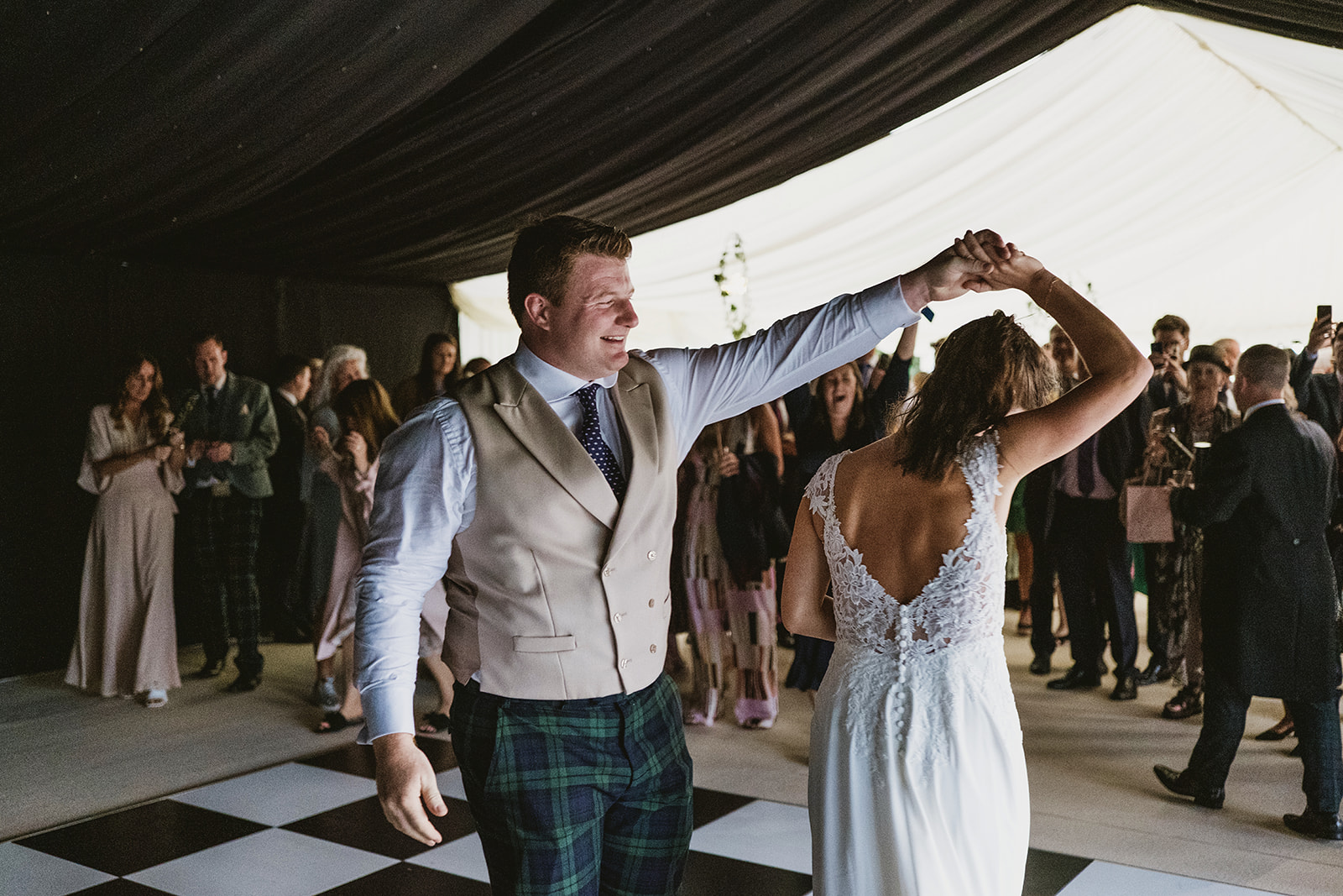 candid natural photography at a riverside marquee wedding in Buckinghamshire by York Place Studios