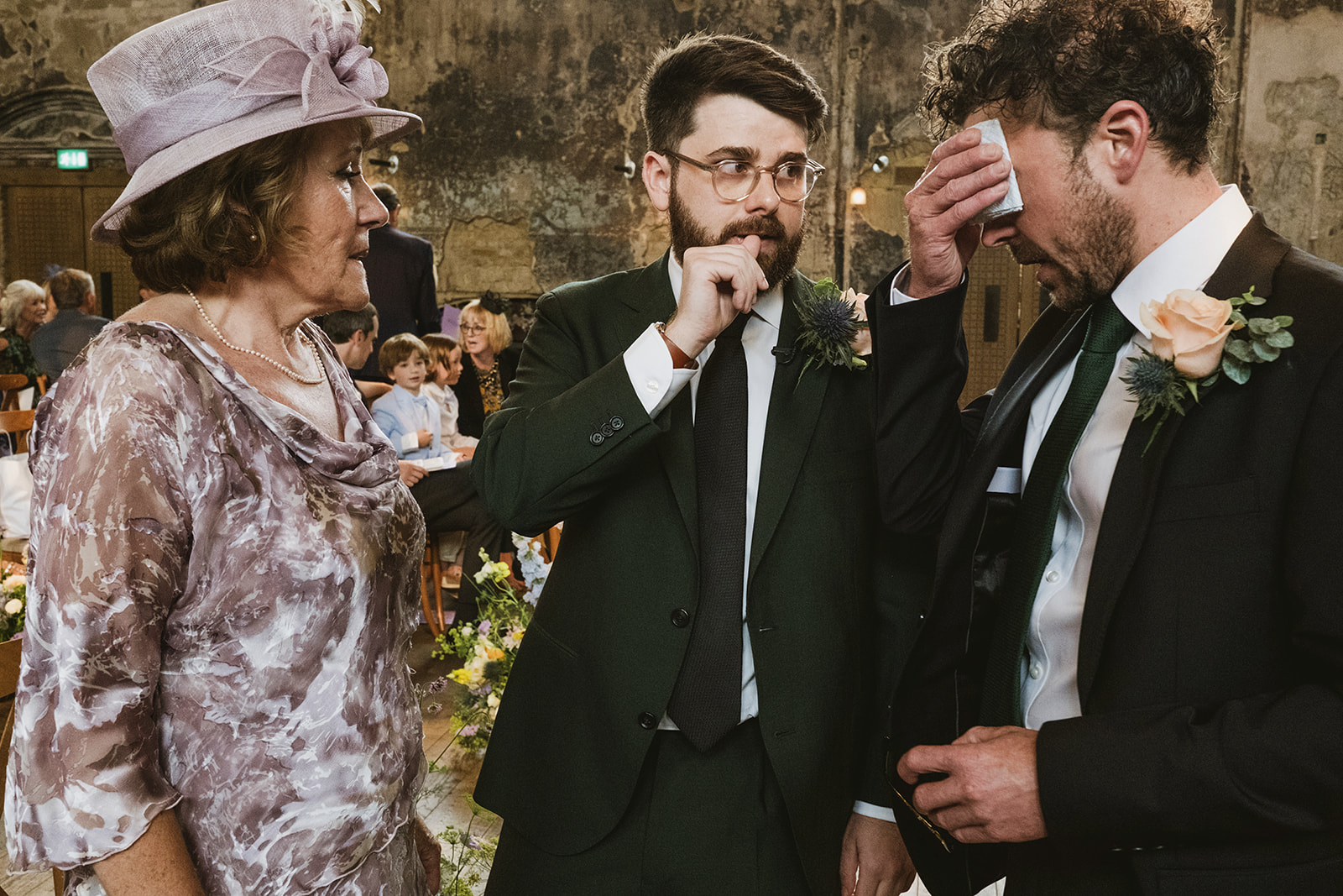 photos from a Battersea Arts Centre wedding with meadow style florals and natural street photography style with York Place Studios