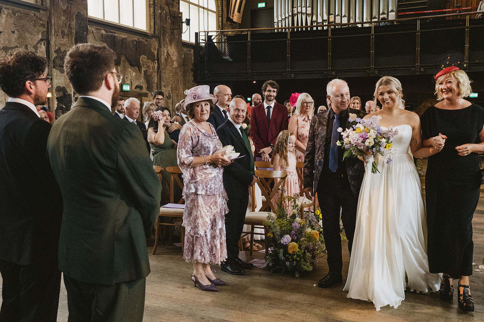 Colette and Rhys's family focused south west London wedding with meadow style florals and natural street photography style with York Place Studios
