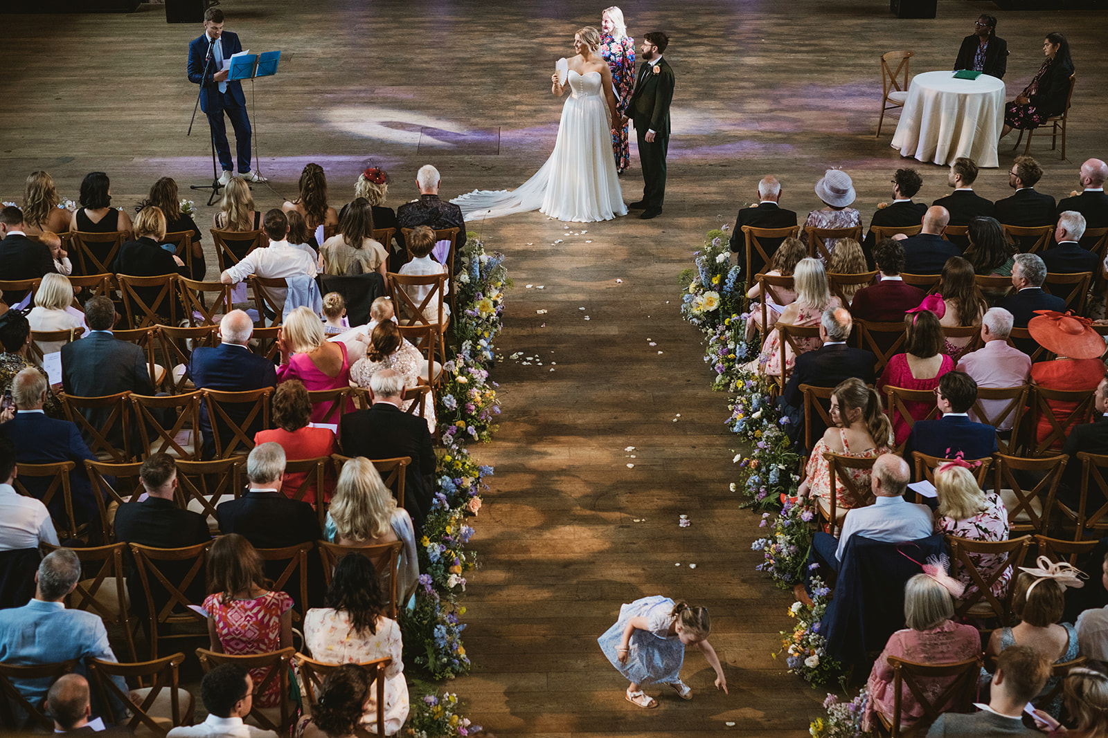 photos from a Battersea London wedding with meadow style florals and natural street photography style with York Place Studios