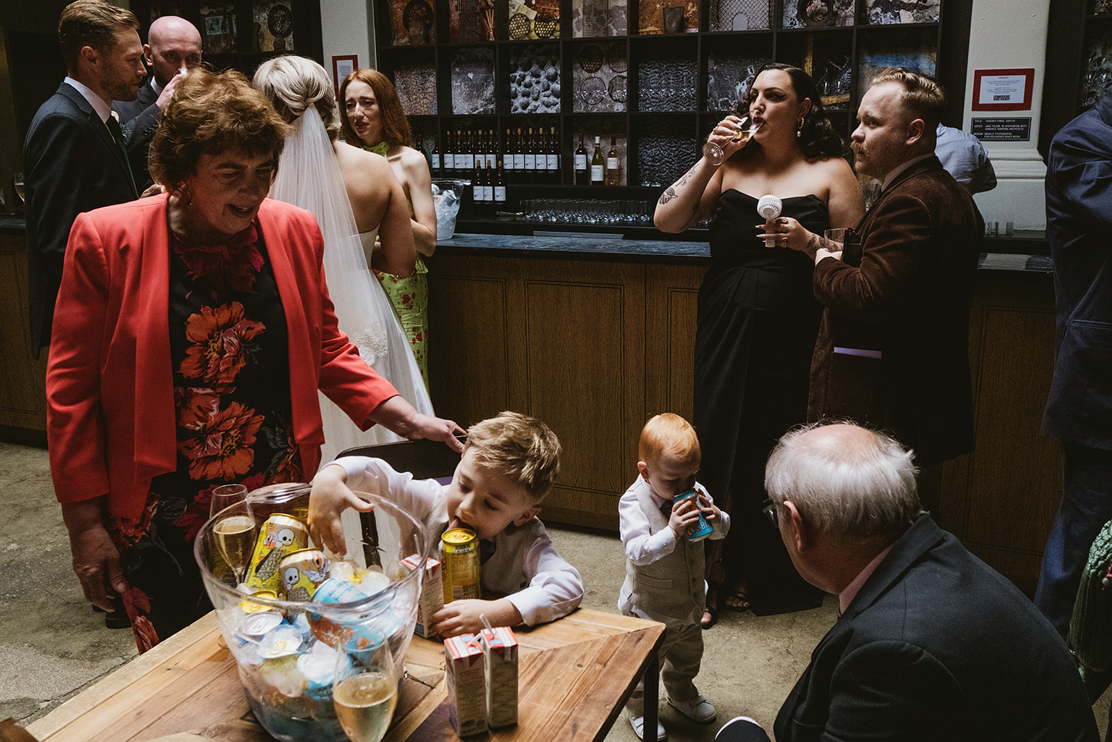 photos from a Battersea Arts Centre wedding with meadow style florals and natural street photography style with York Place Studios