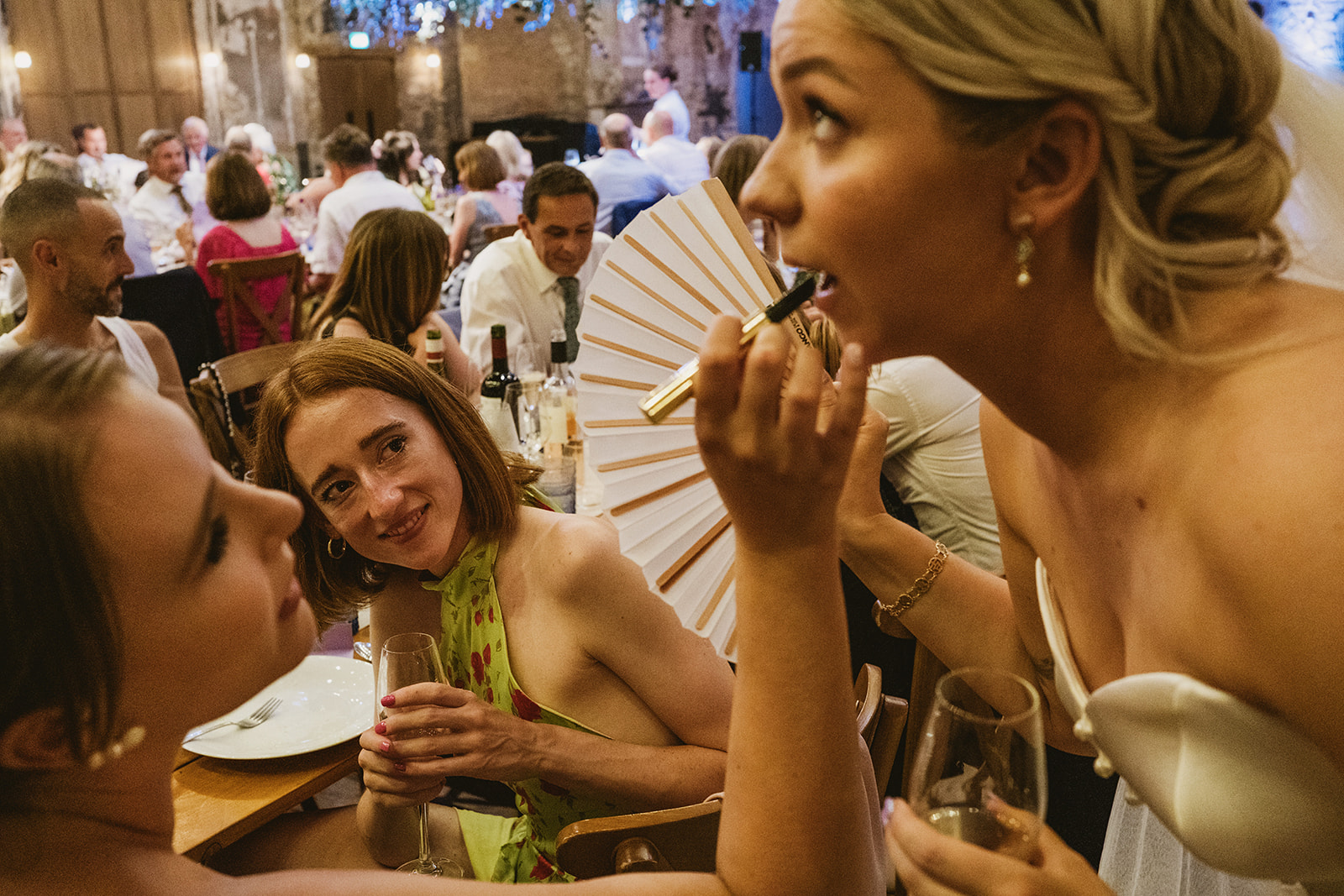 photos from a Battersea Arts Centre wedding with meadow style florals and natural street photography style with York Place Studios