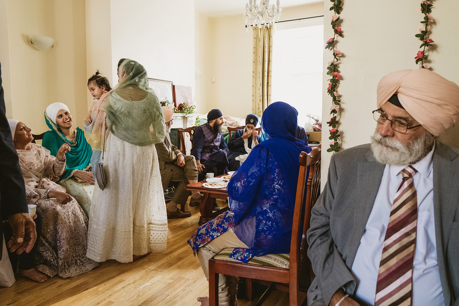 Peaceful, joyful and chaotic moments from a Sikh wedding photographed in a modern documentary style with photographs by York Place Studios