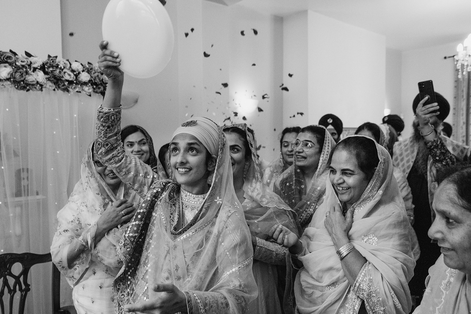 Authentic moments from a Sikh wedding photographed in a modern documentary style with photographs by York Place Studios
