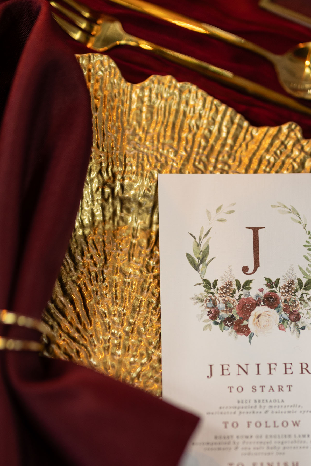 warm red winter wedding ideas with candlelight from a setup at Battleford with photographer Howard South West