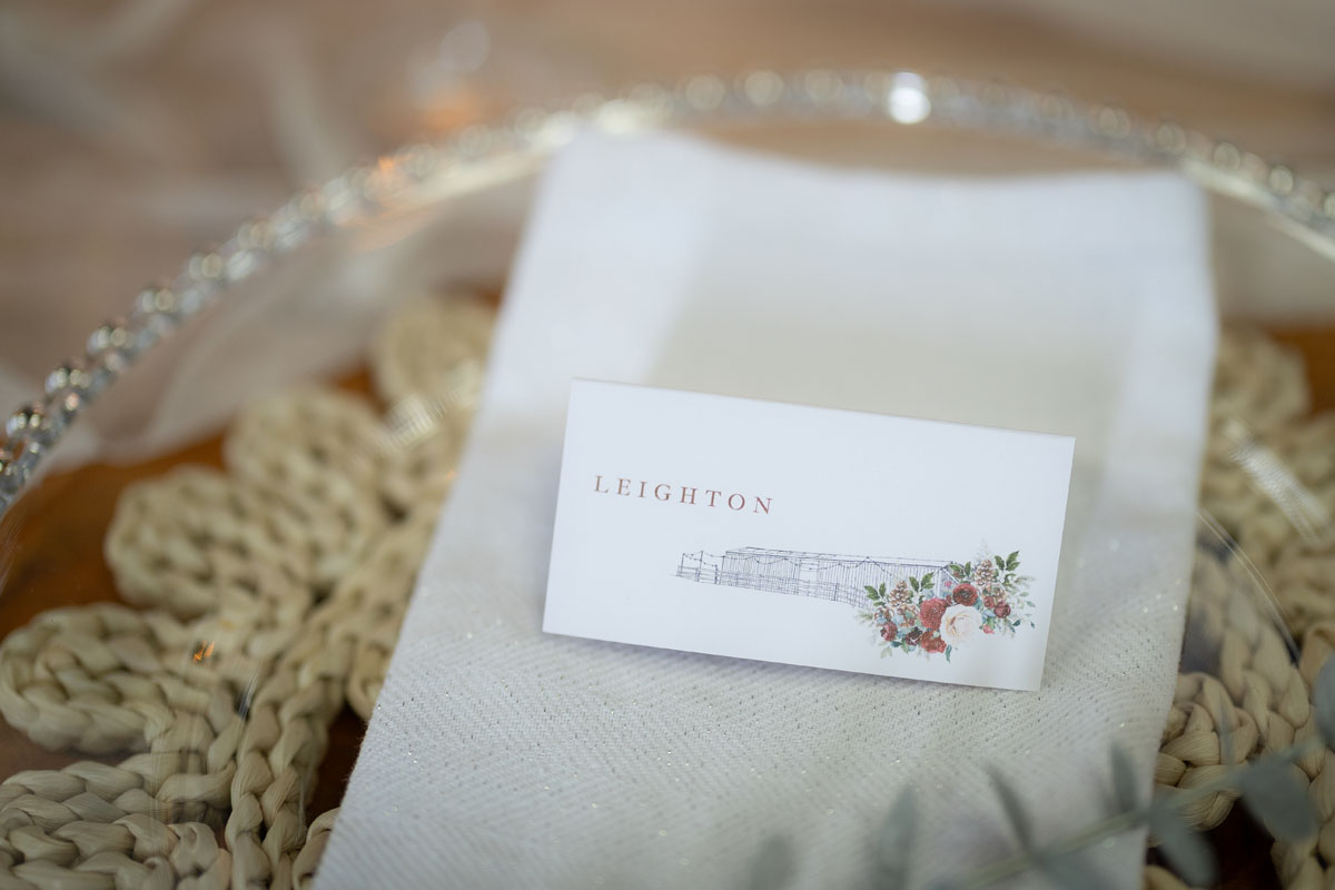 warm red winter wedding ideas with candlelight from a setup at Battleford with photographer Howard South West