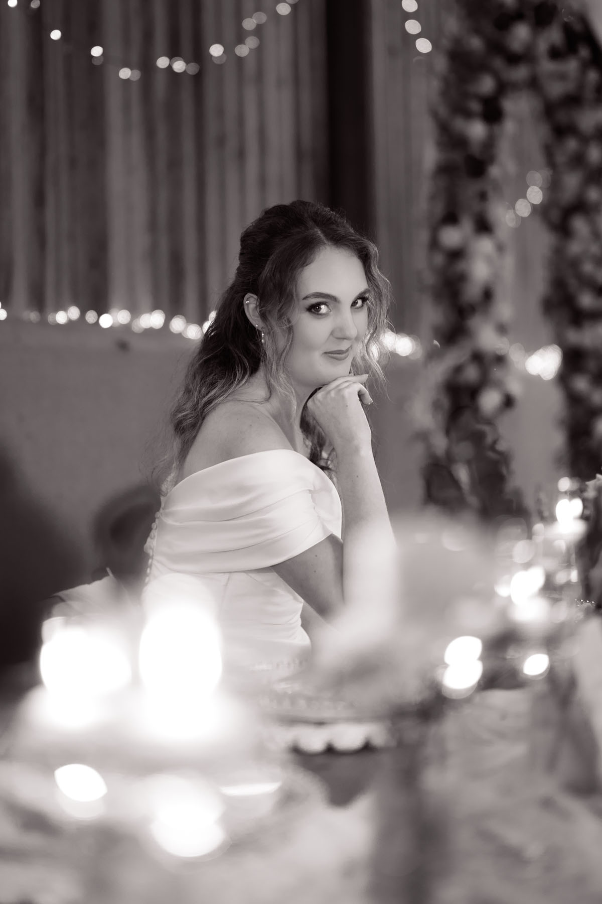 warm red winter wedding ideas with candlelight from a setup at Battleford with photographer Howard South West