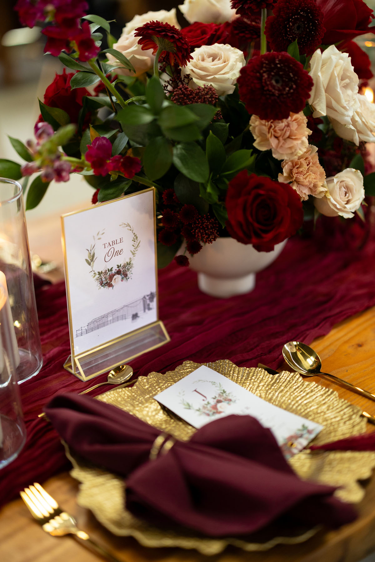 warm red winter wedding ideas with candlelight from a setup at Battleford with photographer Howard South West
