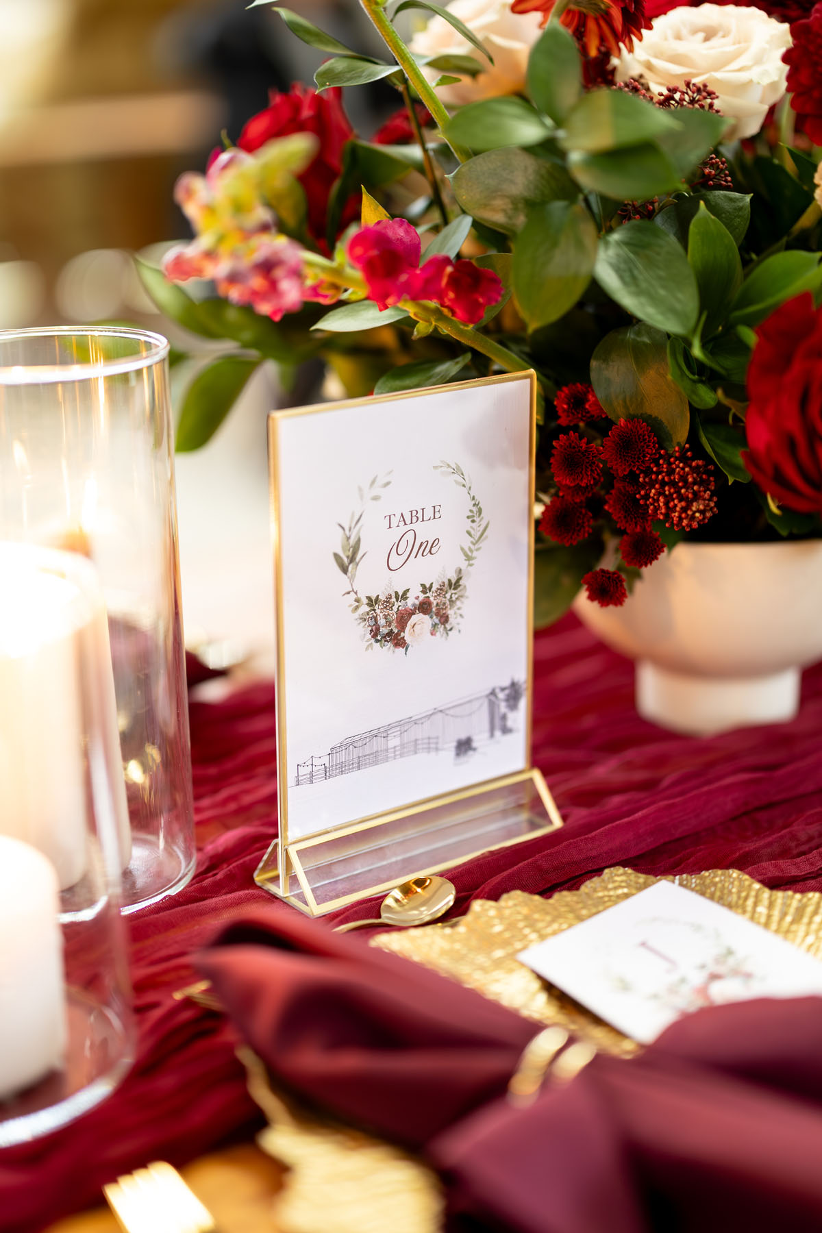warm red winter wedding ideas with candlelight from a setup at Battleford with photographer Howard South West