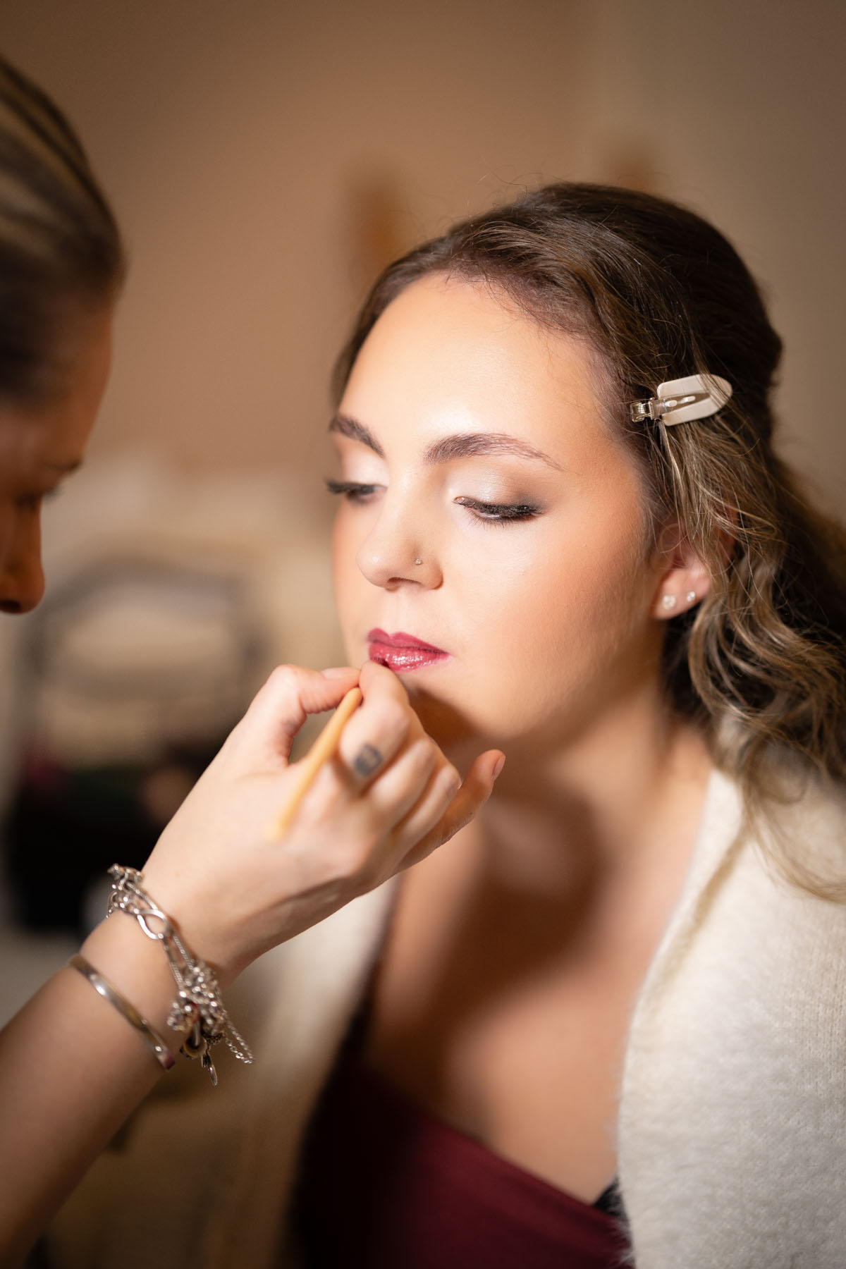warm red winter wedding ideas with candlelight from a setup at Battleford with photographer Howard South West
