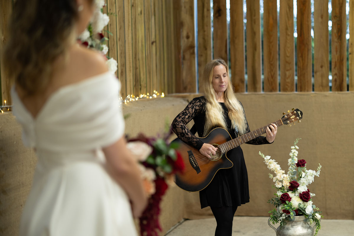warm red winter wedding ideas with candlelight from a setup at Battleford with photographer Howard South West