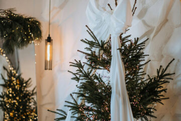 Christmas tree placeholder image with white draped fabric bow