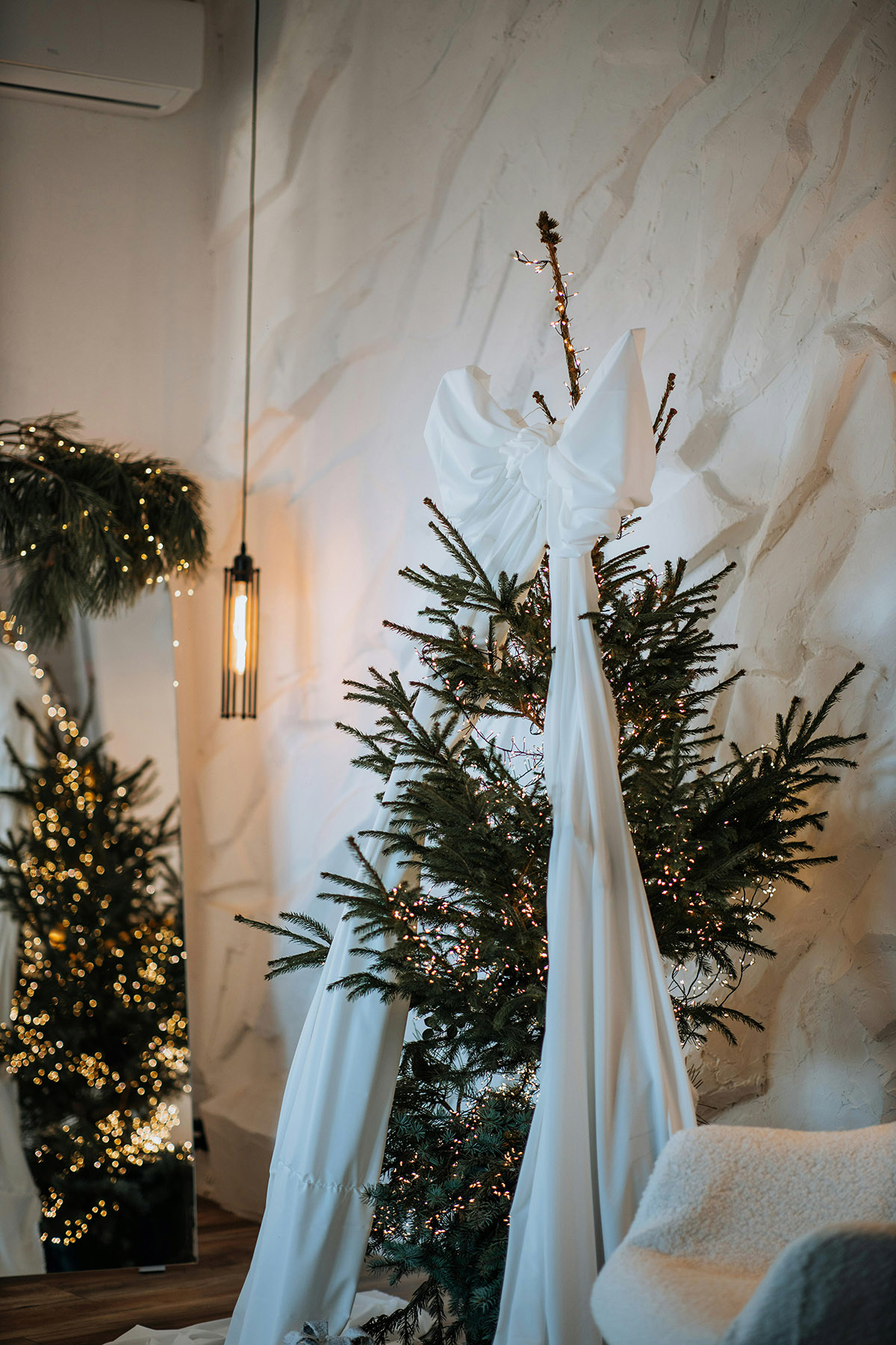 Christmas tree placeholder image with white draped fabric bow