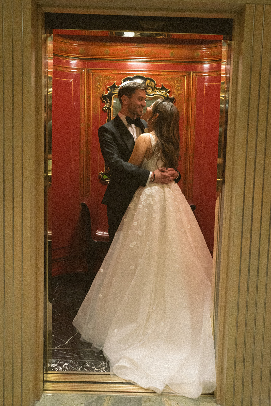 photograph of a luxury wedding at The Savoy in London with romantic floral styling and candlelight by Rachel Takes Pictures with Elegante by Michelle J