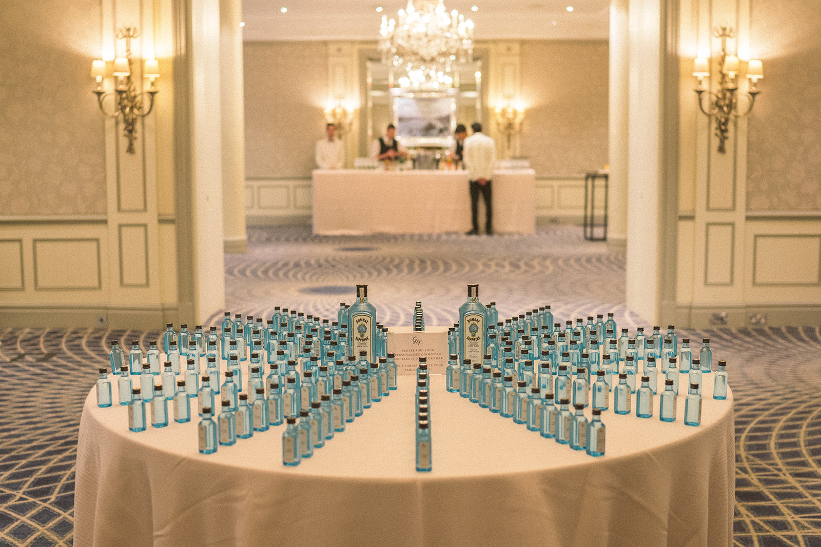 photograph of a luxury wedding at The Savoy in London with romantic floral styling and candlelight by Rachel Takes Pictures with Elegante by Michelle J