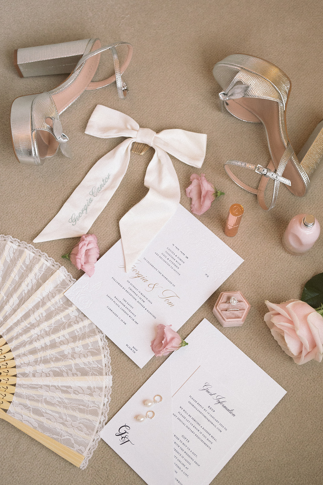 photograph of a luxury wedding at The Savoy in London with romantic floral styling and candlelight by Rachel Takes Pictures with Elegante by Michelle J