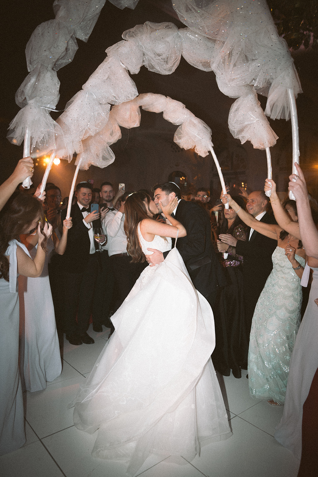 photograph of a luxury wedding at The Savoy in London with romantic floral styling and candlelight by Rachel Takes Pictures with Elegante by Michelle J