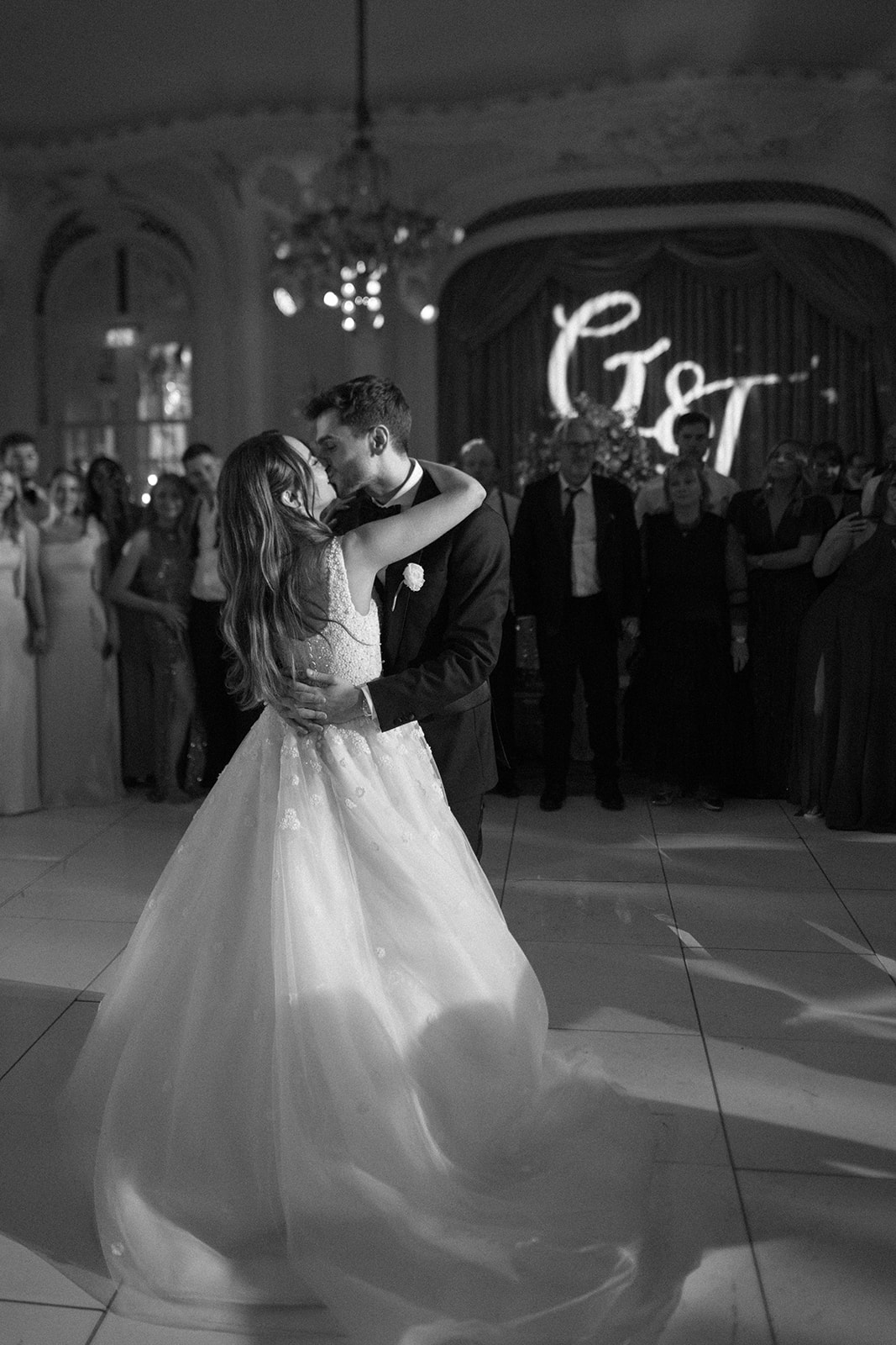 photograph of a luxury wedding at The Savoy in London with romantic floral styling and candlelight by Rachel Takes Pictures with Elegante by Michelle J