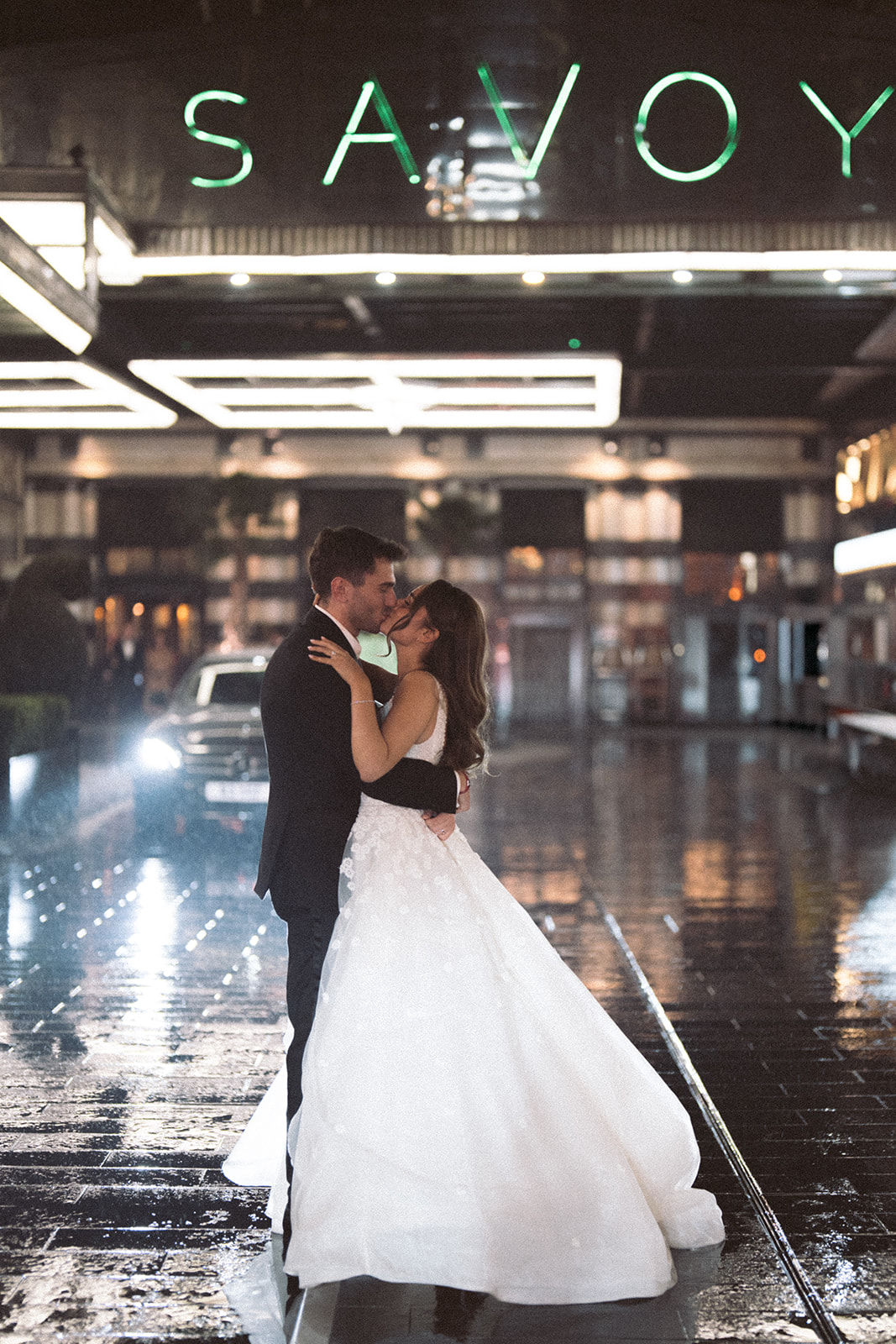 photograph of a luxury wedding at The Savoy in London with romantic floral styling and candlelight by Rachel Takes Pictures with Elegante by Michelle J