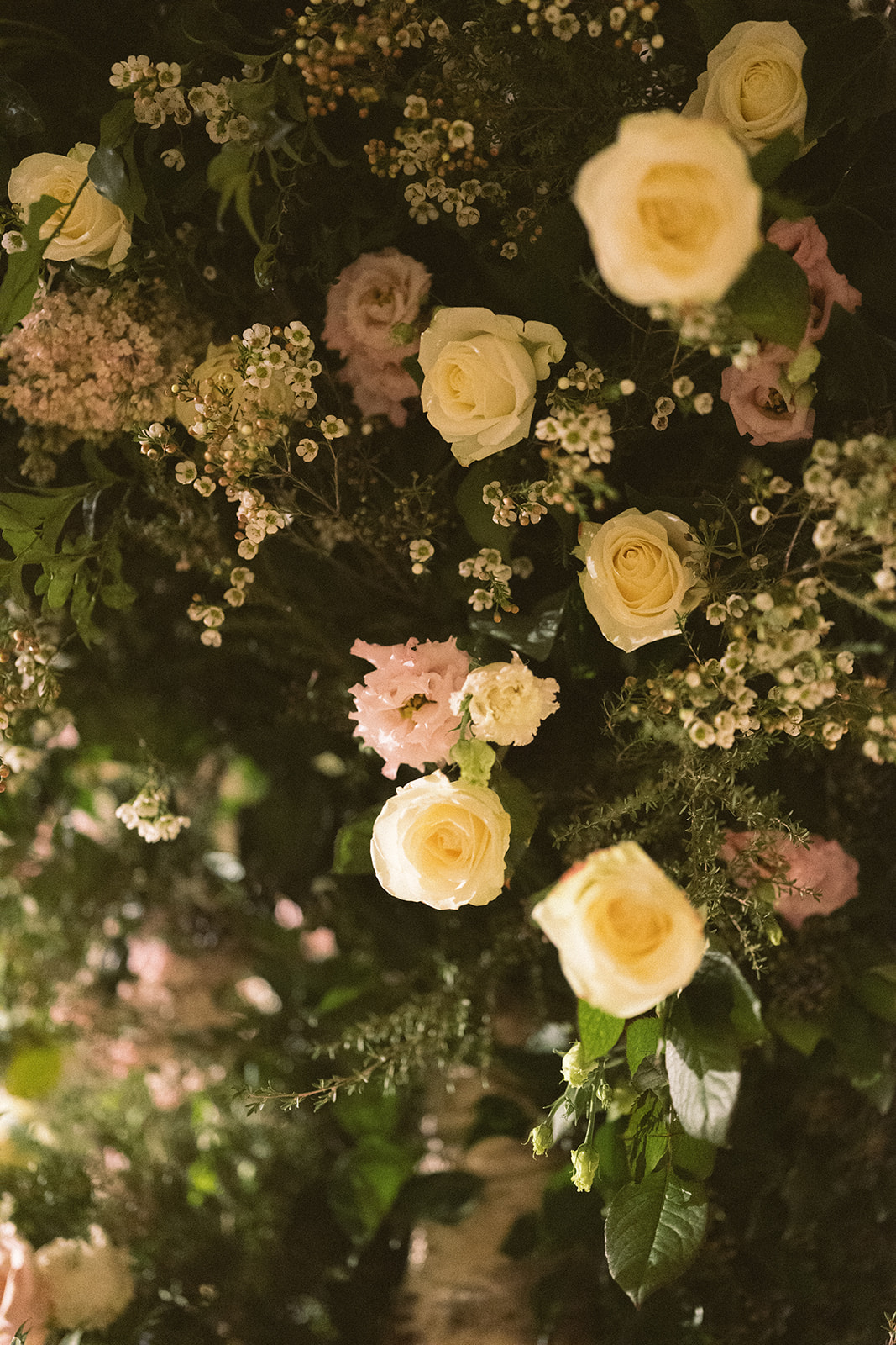 photograph of a luxury wedding at The Savoy in London with romantic floral styling and candlelight by Rachel Takes Pictures with Elegante by Michelle J