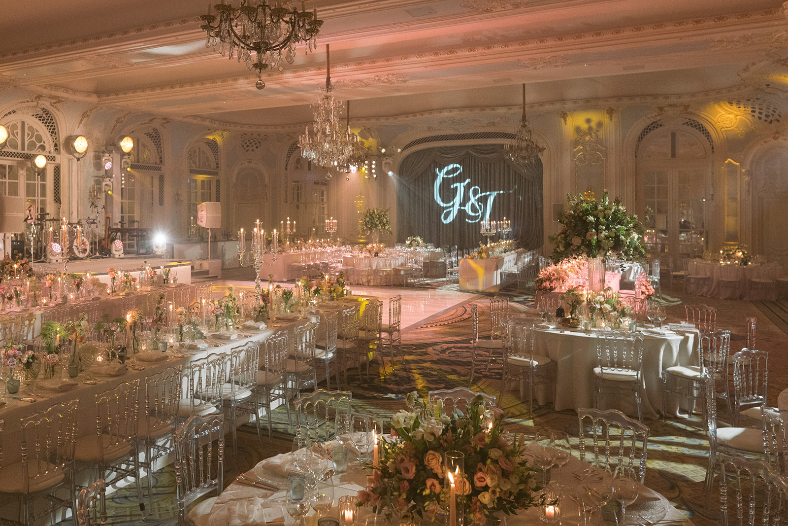 photograph of a luxury wedding at The Savoy in London with romantic floral styling and candlelight by Rachel Takes Pictures with Elegante by Michelle J