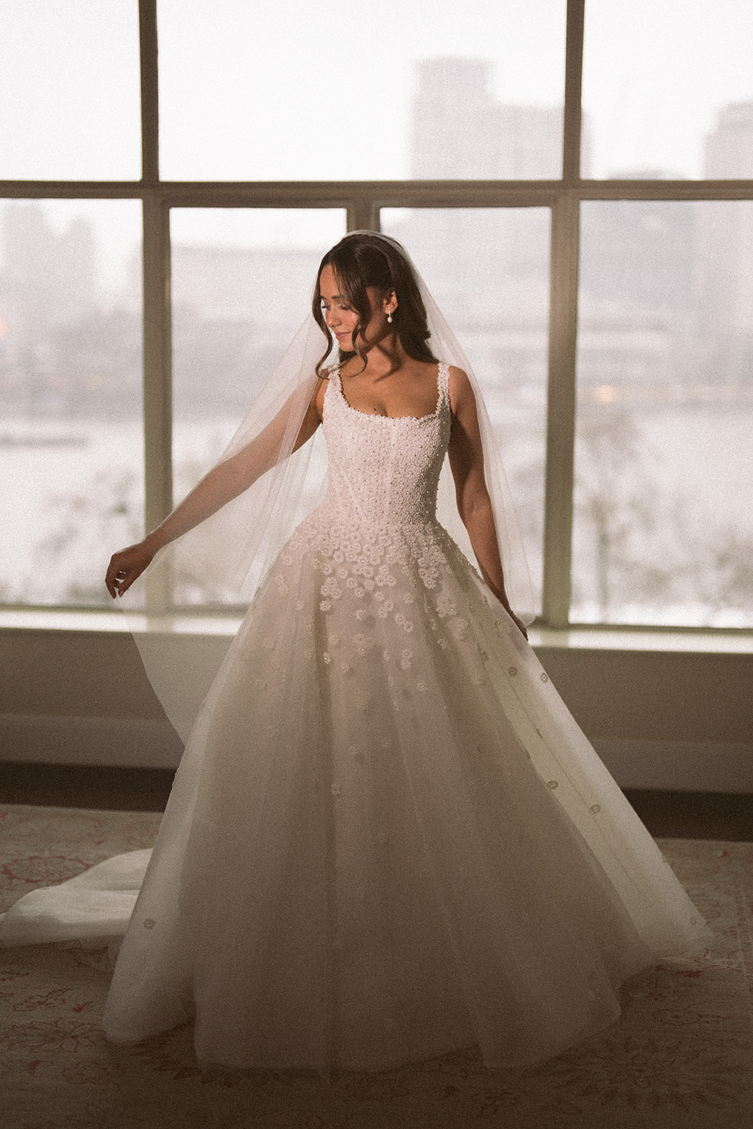 photograph of a luxury wedding at The Savoy in London with romantic floral styling and candlelight by Rachel Takes Pictures with Elegante by Michelle J