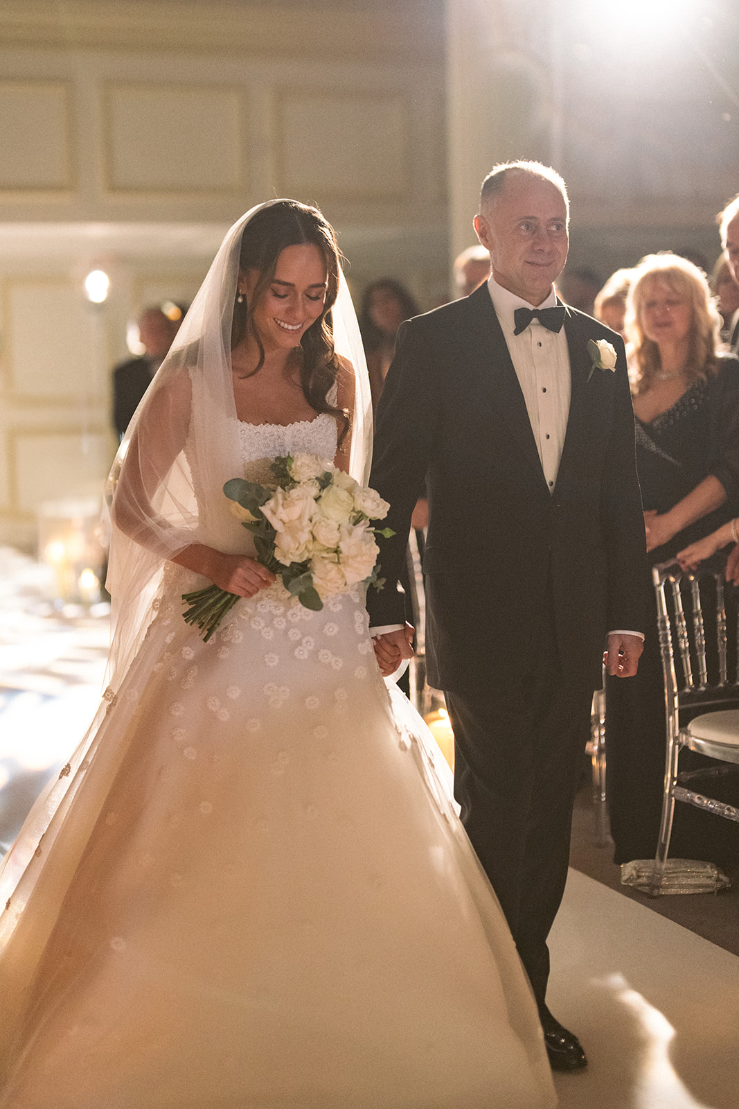 photograph of a luxury wedding at The Savoy in London with romantic floral styling and candlelight by Rachel Takes Pictures with Elegante by Michelle J