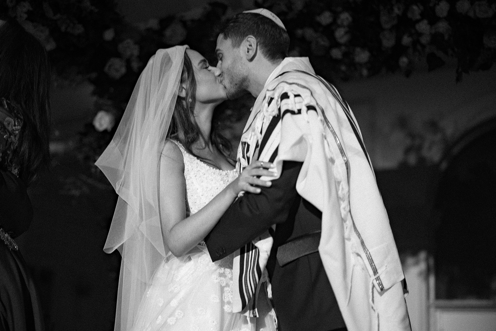 photograph of a luxury wedding at The Savoy in London with romantic floral styling and candlelight by Rachel Takes Pictures with Elegante by Michelle J