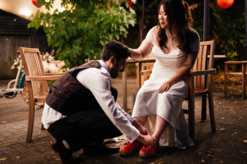 Loving moment between groom and bride UK documentary wedding photographer Simon Dewey