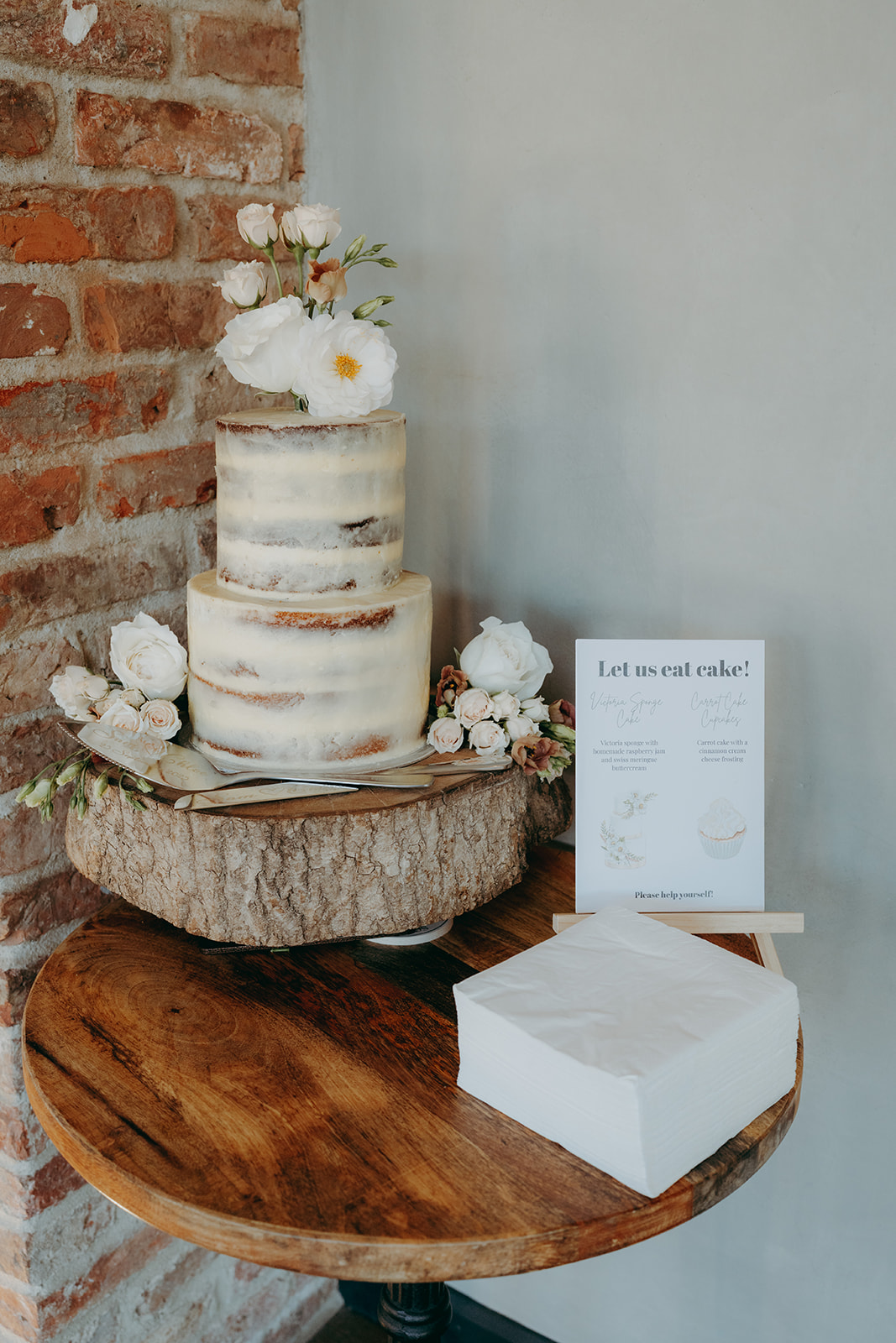 Real wedding at Thirsk Barn near Harrogate with a groom in a dark green suit and bride in a slim fitting dress with long gloves. Image by Yorkshire wedding photographer Joss Denham Photography