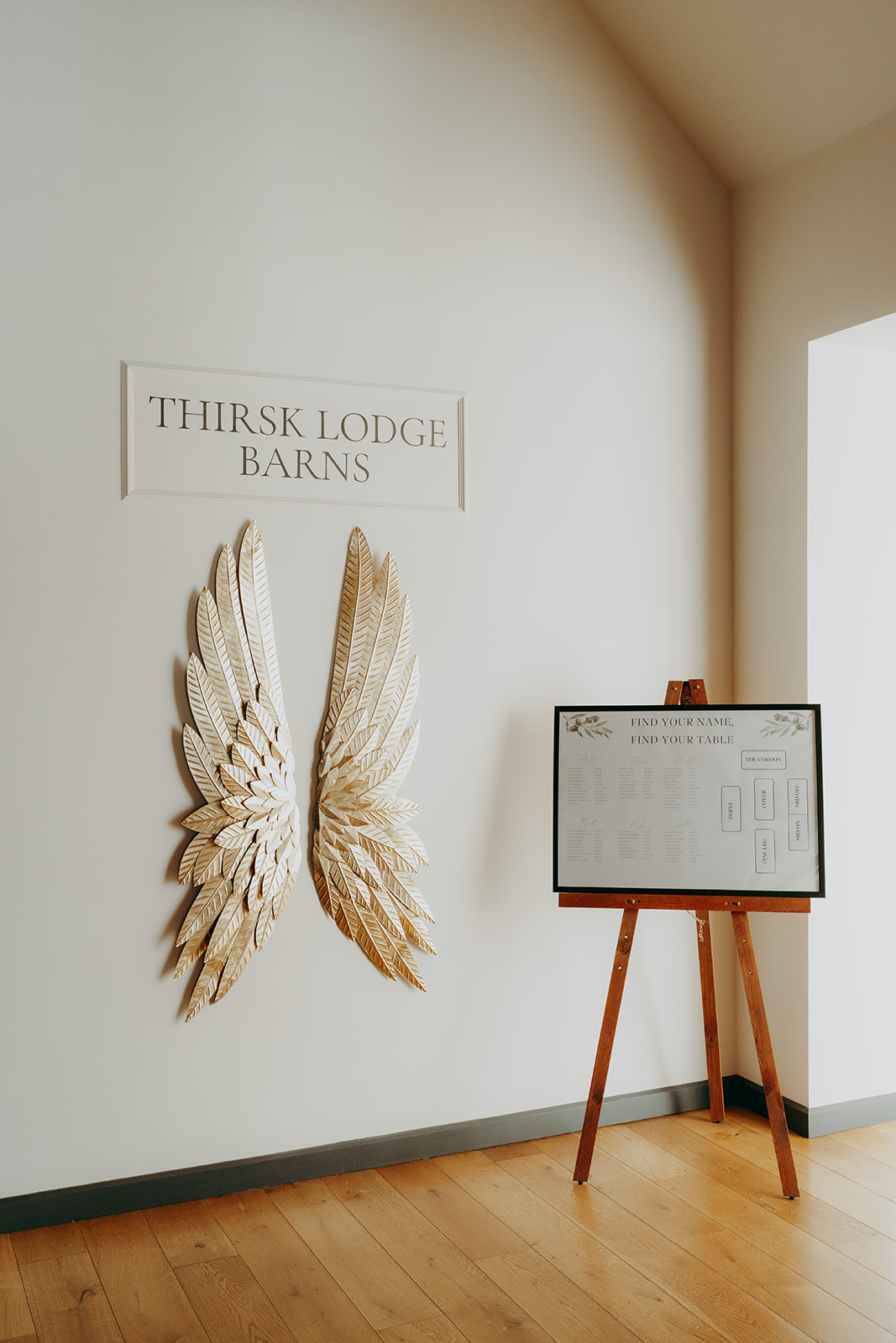 Real wedding at Thirsk Barn near Harrogate with a groom in a dark green suit and bride in a slim fitting dress with long gloves. Image by Yorkshire wedding photographer Joss Denham Photography