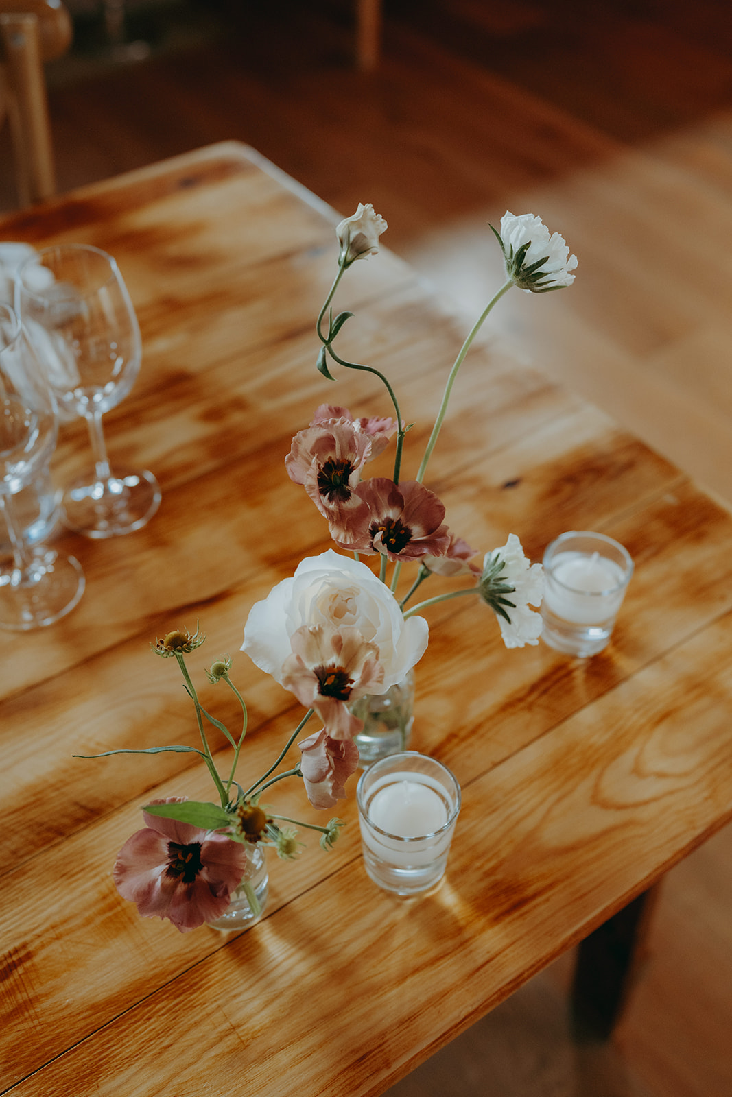 Real wedding at Thirsk Barn near Harrogate with a groom in a dark green suit and bride in a slim fitting dress with long gloves. Image by Yorkshire wedding photographer Joss Denham Photography